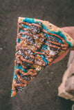 Brother Bruno Cookie Monster dessert pizza slice with Oreo and Nutella drizzle