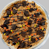 Reese's Peanut Butter Brownie dessert pizza - peanut butter base, brownies, Reese's Pieces and chocolate drizzle - Brother Bruno Direct